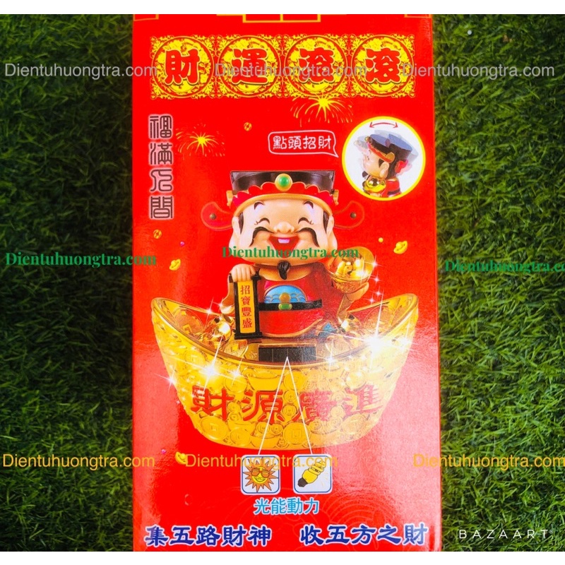 Thần Tài ngồi thỏi vàng gật đầu rứơc may mắn, chào khách vào nhà