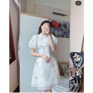 Đầm voan hoa tay phồng cổ bèo đính nơ ngực