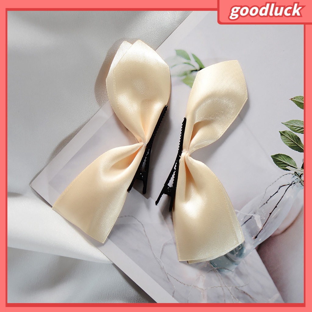 Kẹp tóc hình nơ bướm màu trơn đơn giản dành cho bạn nữ