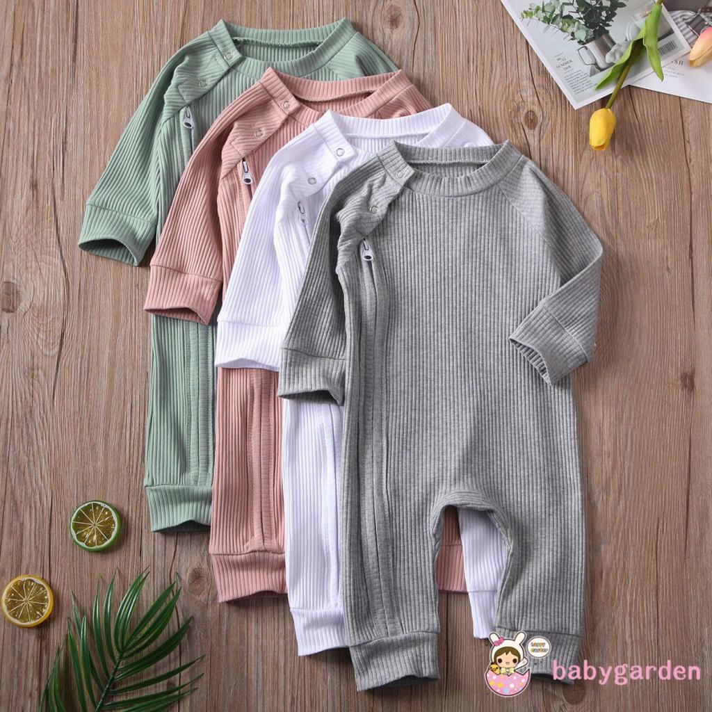 Bộ áo liền quần cổ tròn tay dài màu trơn cài nút phối khóa kéo thời trang cho bé