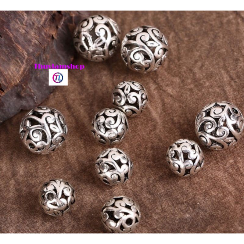 Charm bi cầu hoa văn bạc thái làm vòng