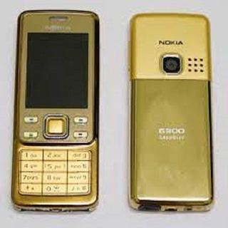 Điện thoại cổ Nokia 6300 màu vàng (main zin + bảo hành 1 năm + có pin và sạc