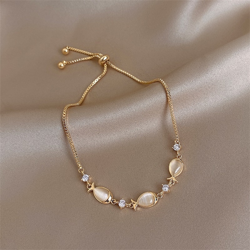Vòng tay mặt hình cá nhỏ đính đá Opal có thể điều chỉnh cho nữ