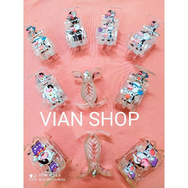 KẸP TÓC TRONG SUỐT IN BÒ SỮA