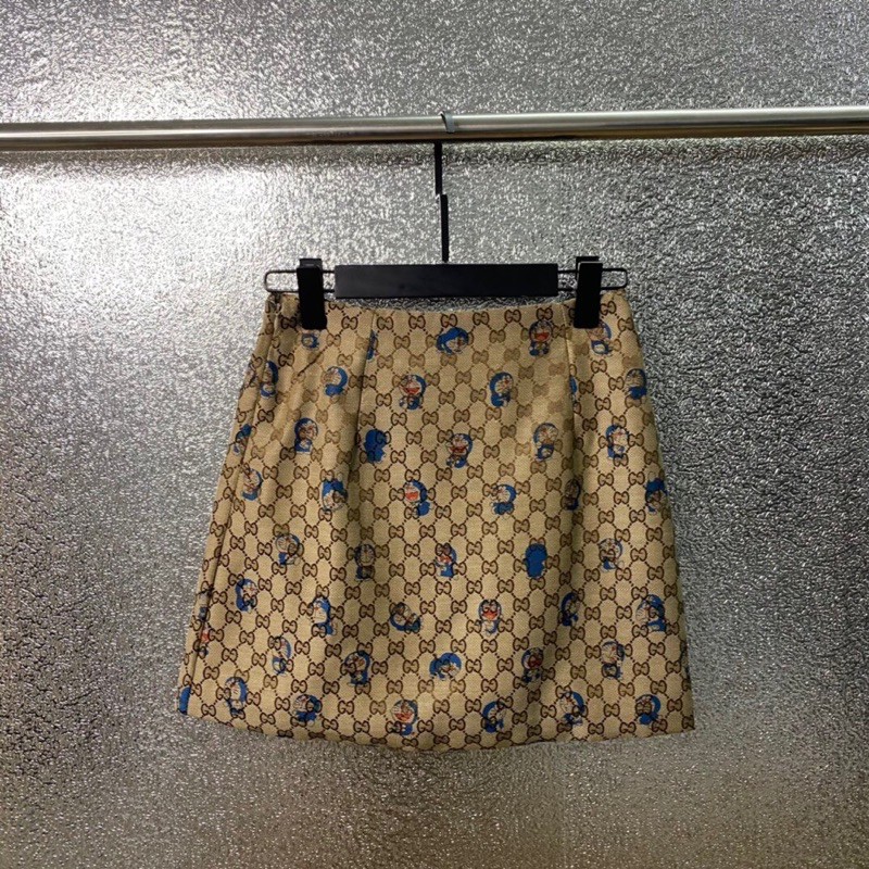 Chân váy ngắn Gucci GC in logo hình doraemon siêu xinh hai màu nâu hồng