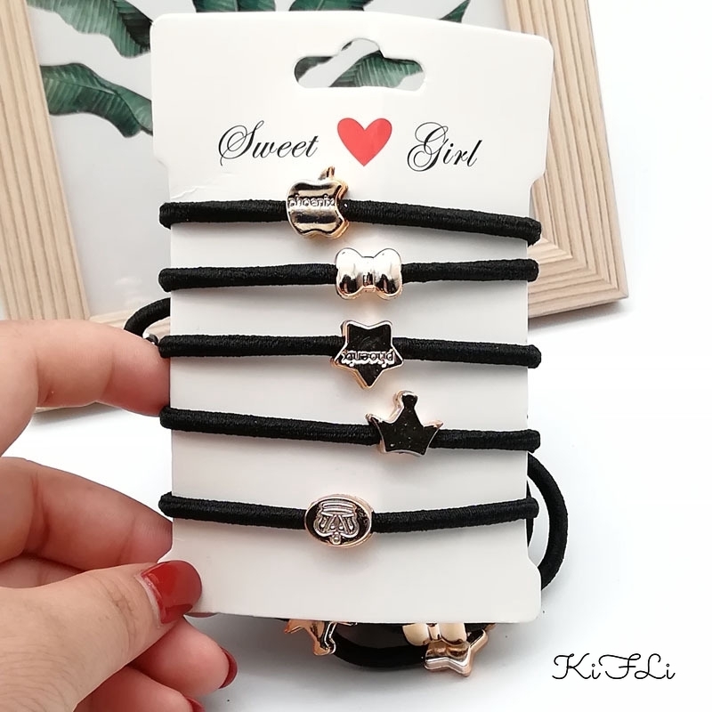 Dây buộc tóc cao su co giãn mặt dây nhiều kiểu dáng màu vàng thời trang cho nữ