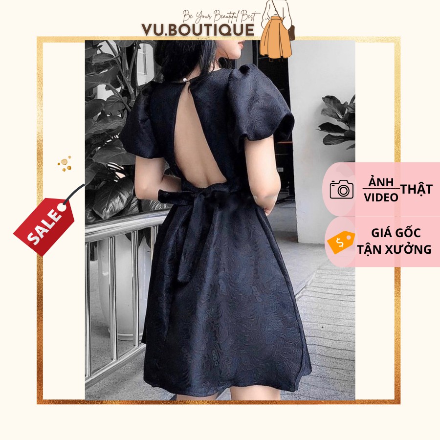 Đầm babydoll gấm đen tay phồng hở lưng