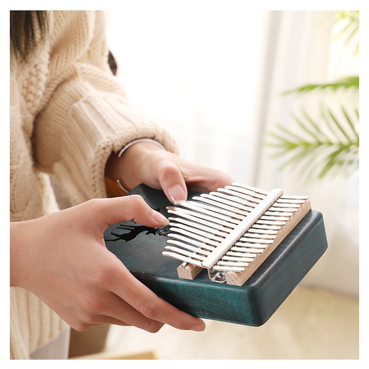 ĐÀN KALIMBA NGUYỆT QUẾ XANH RÊU TẶNG FULL PHỤ KIỆN