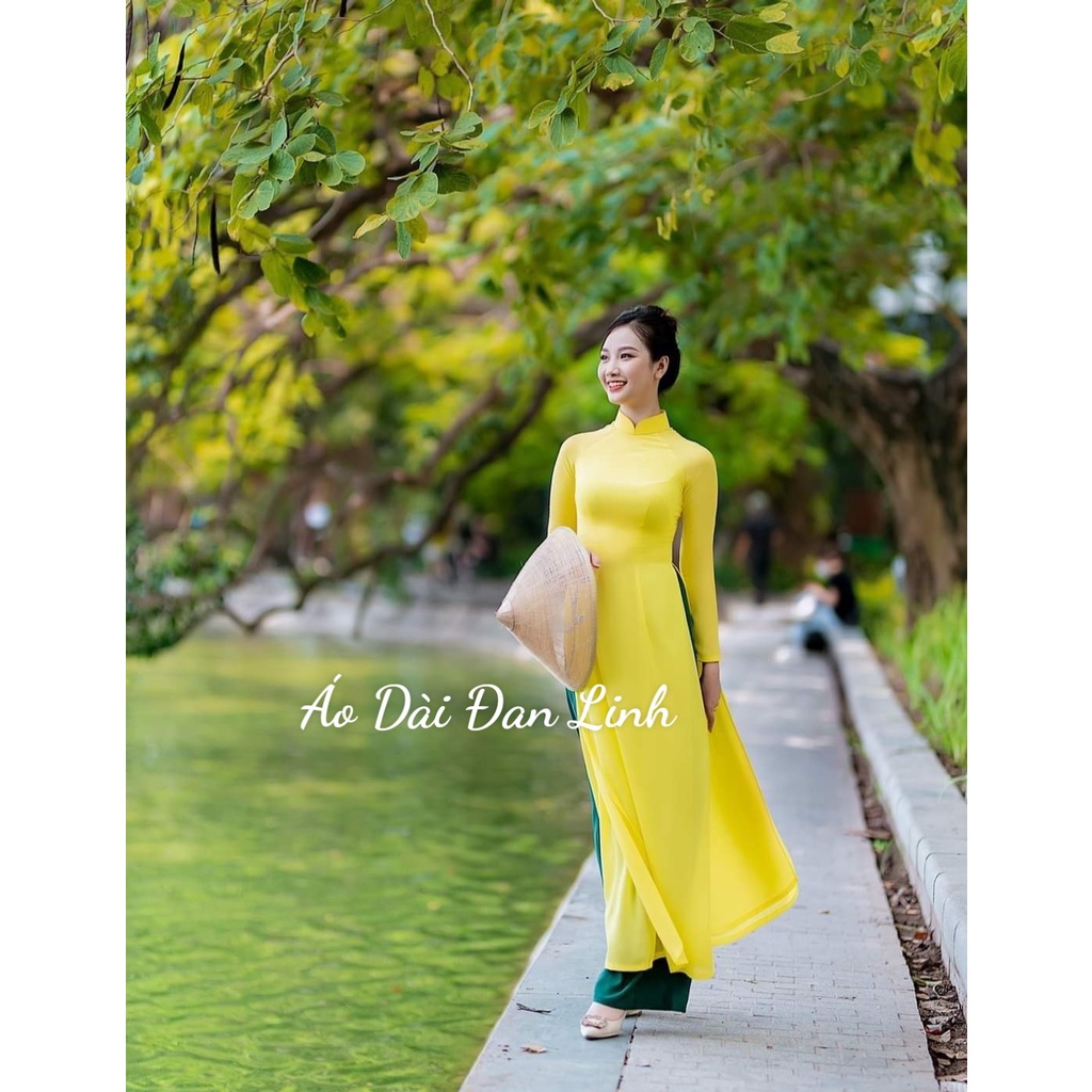 Áo dài trơn 4 tà màu vàng tôn da trẻ trung - Áo Dài Đan Linh