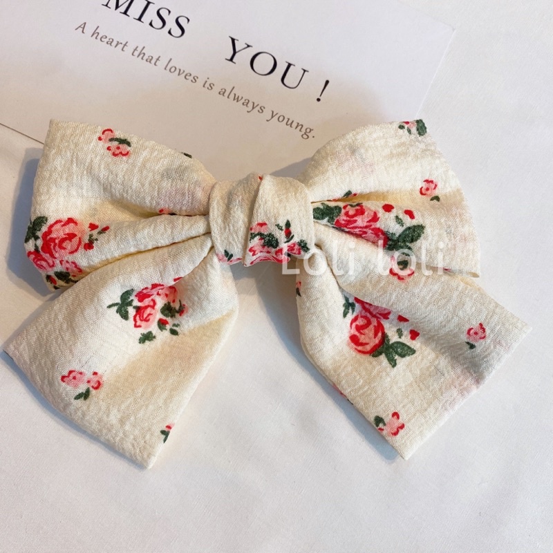 Kẹp tóc nơ hoa nhí phong cách vintage dành cho nữ
