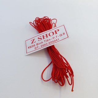 Dây chỉ đỏ xỏ vòng