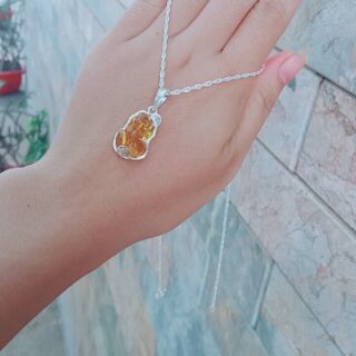 Dây chuyền tỳ hưu đá bọc bạc.