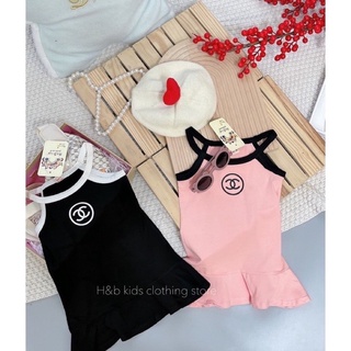 Váy chaneo cổ yếm bé gái