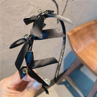 cài nơ xinh xắn màu đen