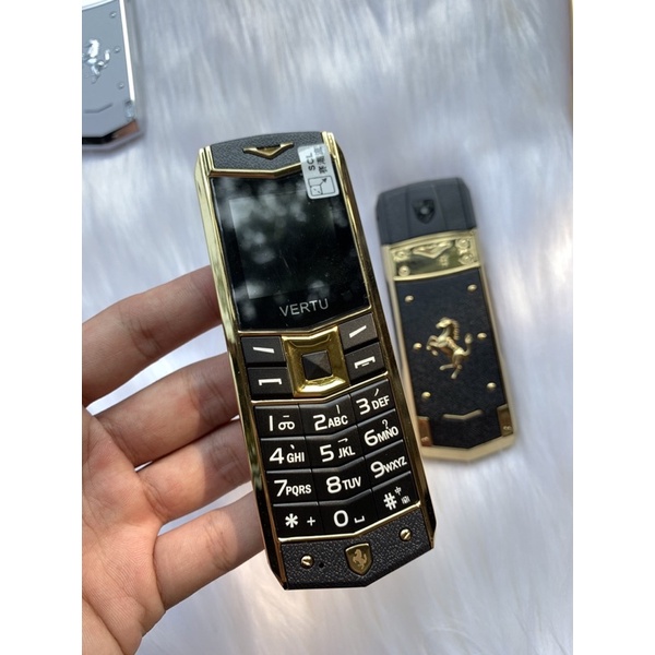 Điện thoại A8 đen vàng