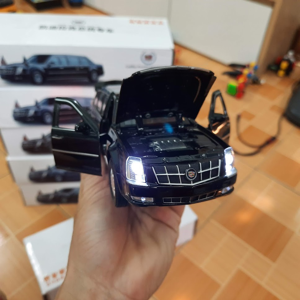 Xe mô hình ô tô cadillac presidential tỉ lệ 1:32 bằng kim loại xe đồ chơi trẻ em mở được cửa có đèn và âm thanh động cơ