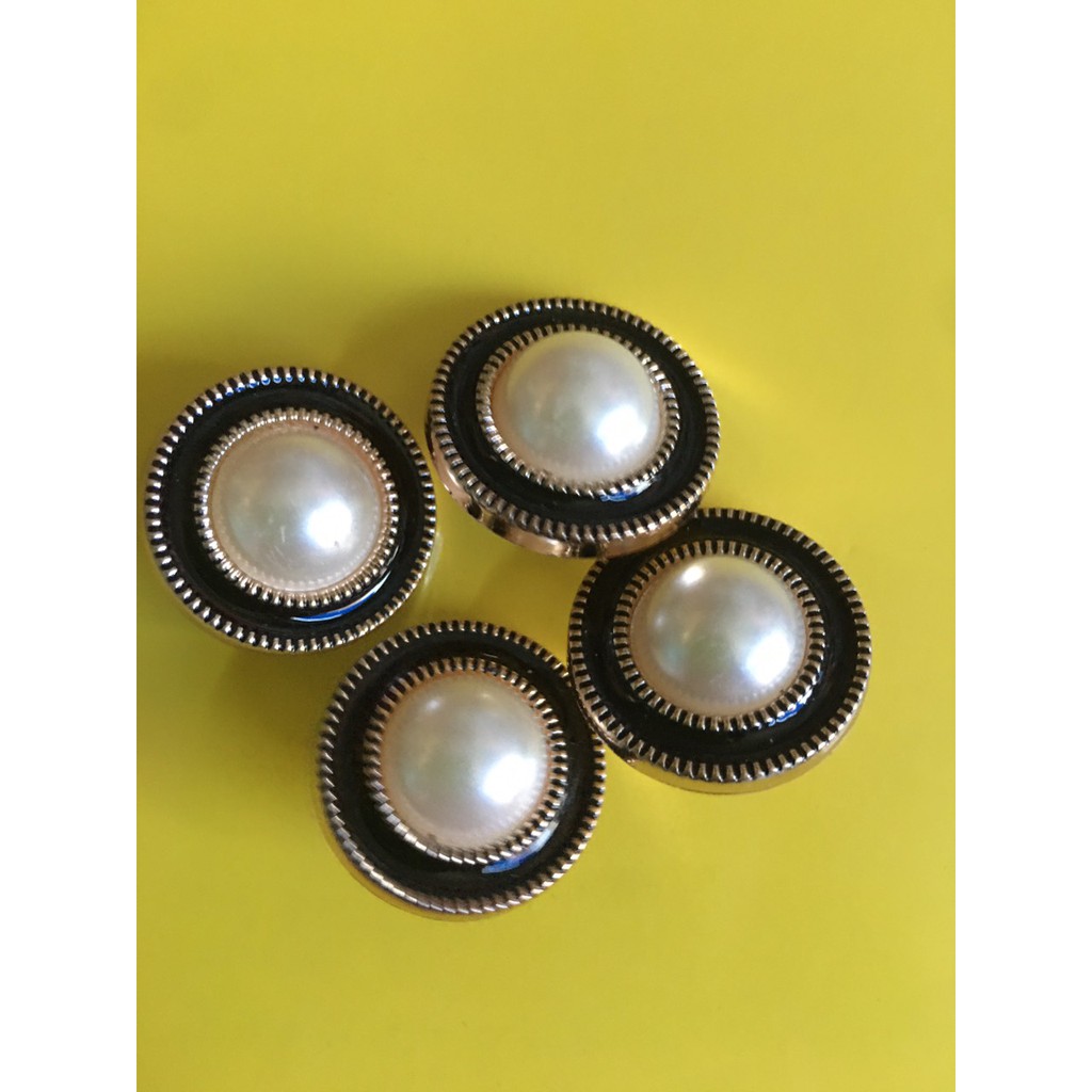 Sét 10 nút ngọc viền đen loại 2cm sử dụng đơm kết áo váy ...