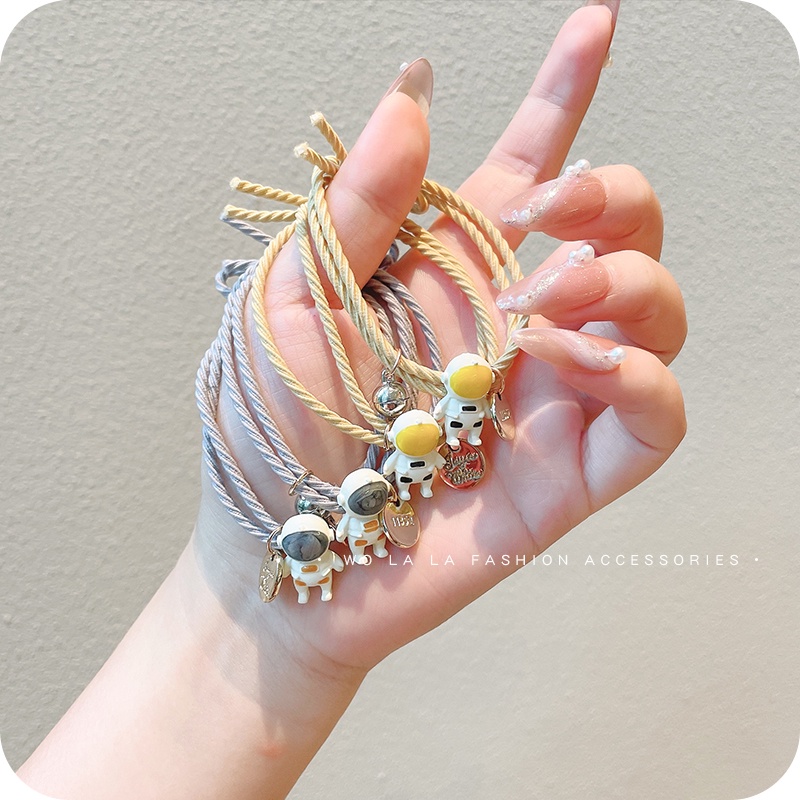 Vòng tay nam châm hình phi hành gia sáng tạo xinh xắn cho cặp đôi