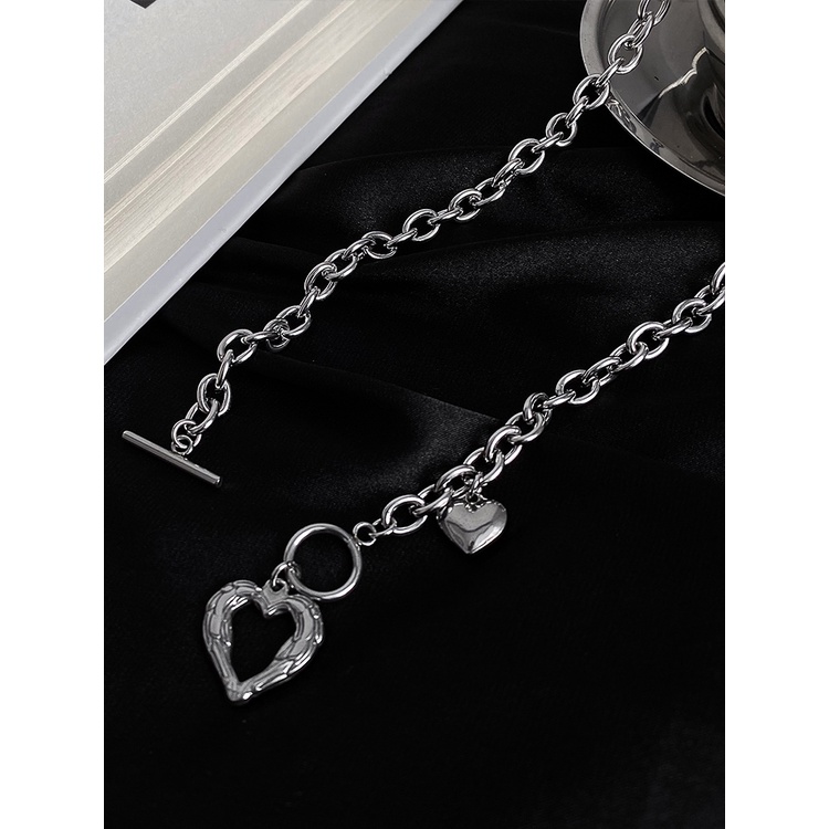 Vòng cổ thép titan mặt hình trái tim khắc rỗng