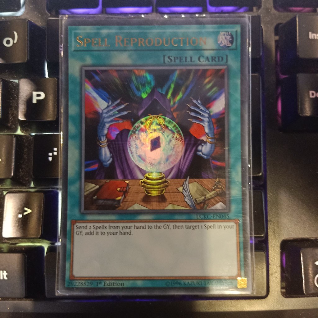 Bài Yu-Gi-Oh! Spell Reproduction - LCKC-EN045 - Ultra Rare