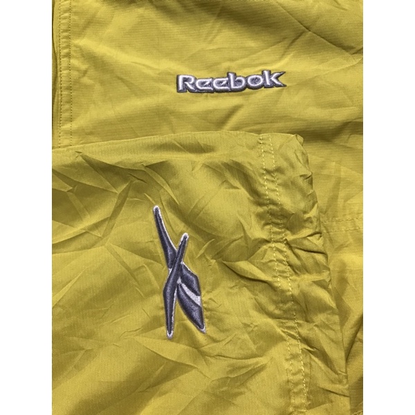 Áo khoác thể thao Nam hiệu Reebok màu vàng size XL