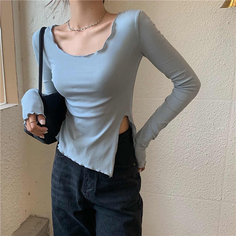 Áo thun ôm dáng tay dài xẻ tà
