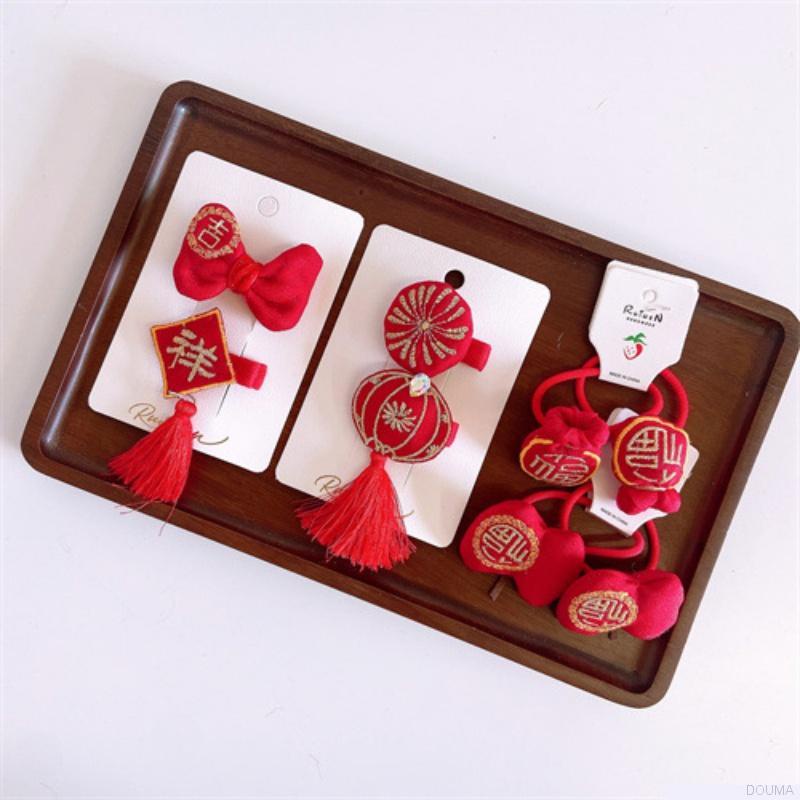 Kẹp tóc hình chúc mừng năm mới đáng yêu cho bé