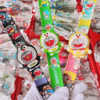 Đồng hồ em bé tay đập, đồ chơi trẻ em hình mèo đôraemon nhiều màu sắc siêu dễ thương