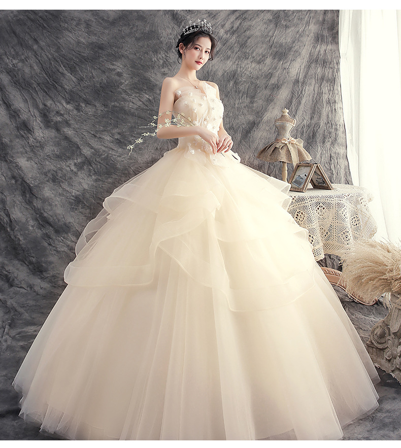 Váy cưới cô dâu phong cách mới rượu sâm banh khí chất bãi cỏ mộng mơ thời trang váy cưới bên bờ biển