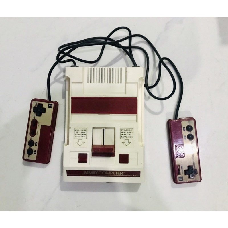 Máy điện tử 4 nút Famicom 1983 xưa