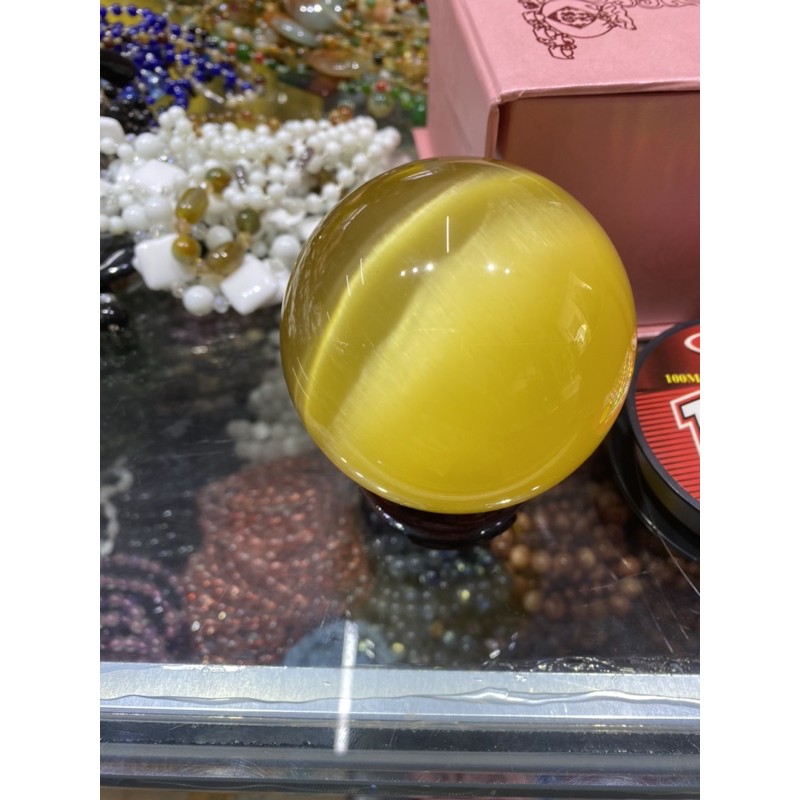 Bi cầu đá mắt mèo vàng hàng đẹp tặng đế loại đẹp