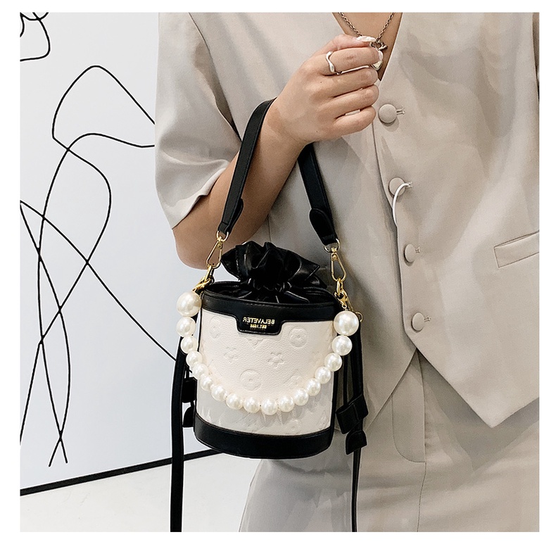 Túi xách nữ mini họa tiết dây ngọc hai màu nâu, đen sang chảnh