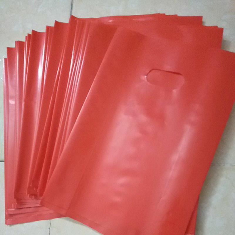 Xấp 1kg túi PE túi nilong đựng hàng hột xoài có quai xách PE bóng dẻo màu đỏ loại 1