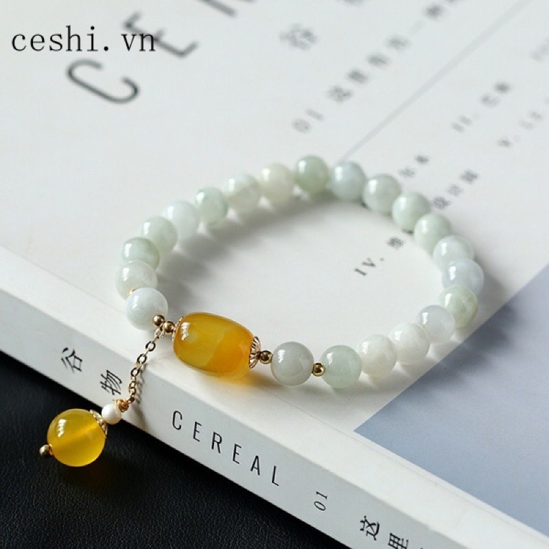 Vòng tay đá xanh mix vàng