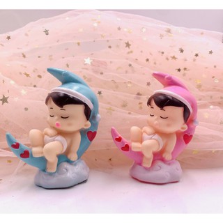 Cặp em bé mặt trăng trang trí bánh kem