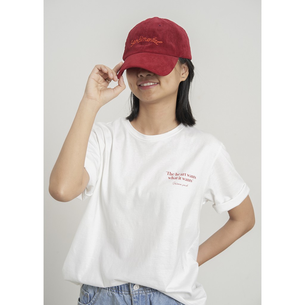 Áo thun in trắng cotton The heart wants what it wants