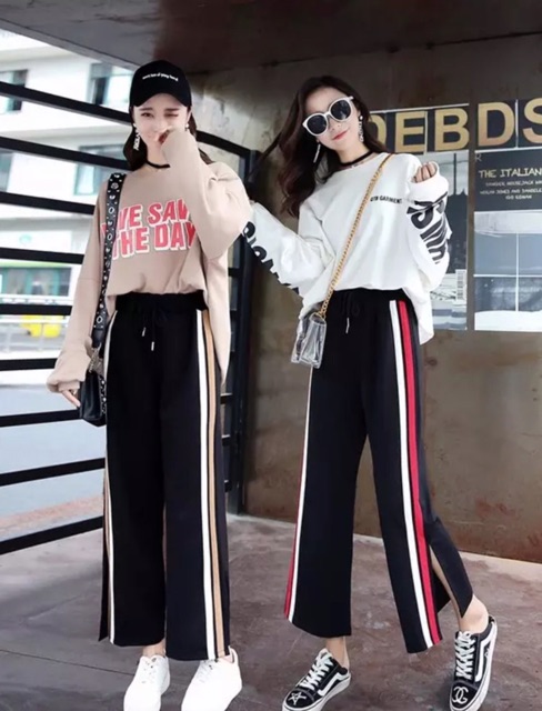 Quần sọc suông xẻ gấu