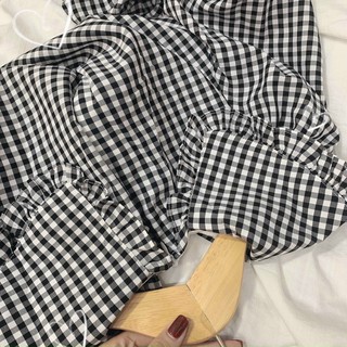 Đầm caro đen trắng cổ sen