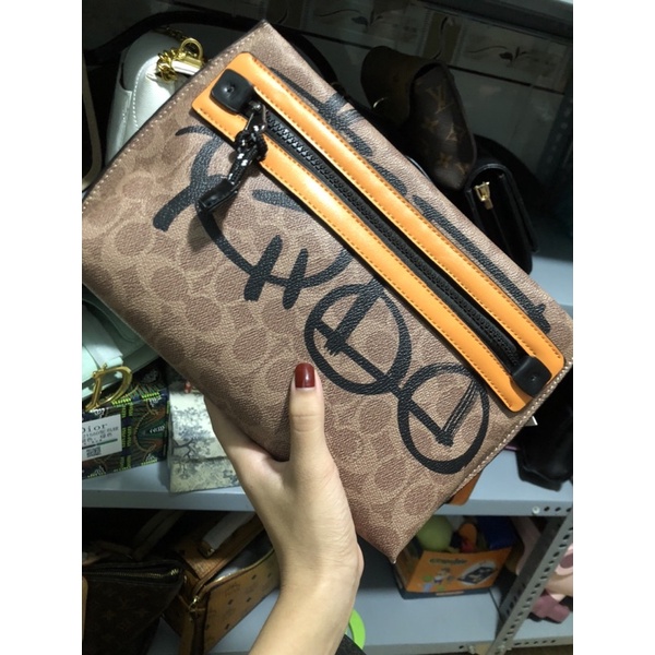 Túi coách nhà mĩm