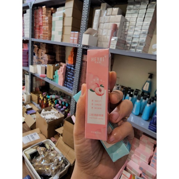 Xịt thơm miệng kháng khuẩn chính hãng nội địa Trung hương bạc hà the mát và đào ngọt