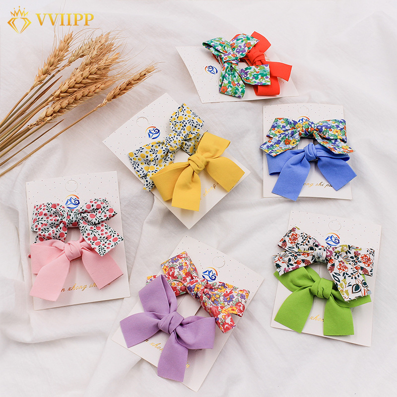 Set kẹp tóc nơ màu trơn/in hoa thời trang Hàn Quốc đơn giản cho nữ