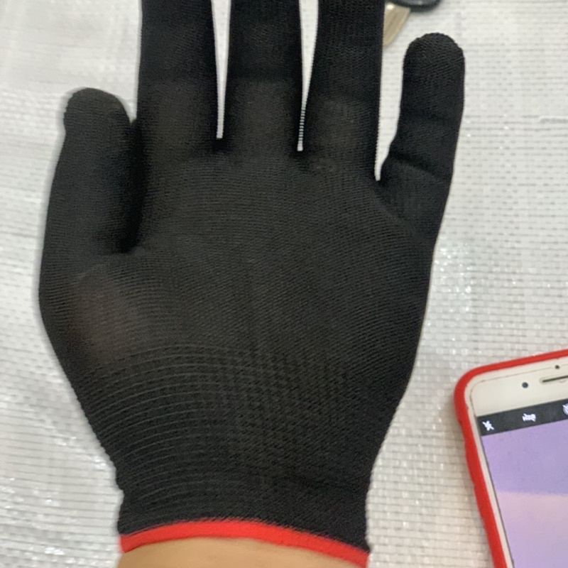 1 lố găng tay mút màu đen và màu ghi