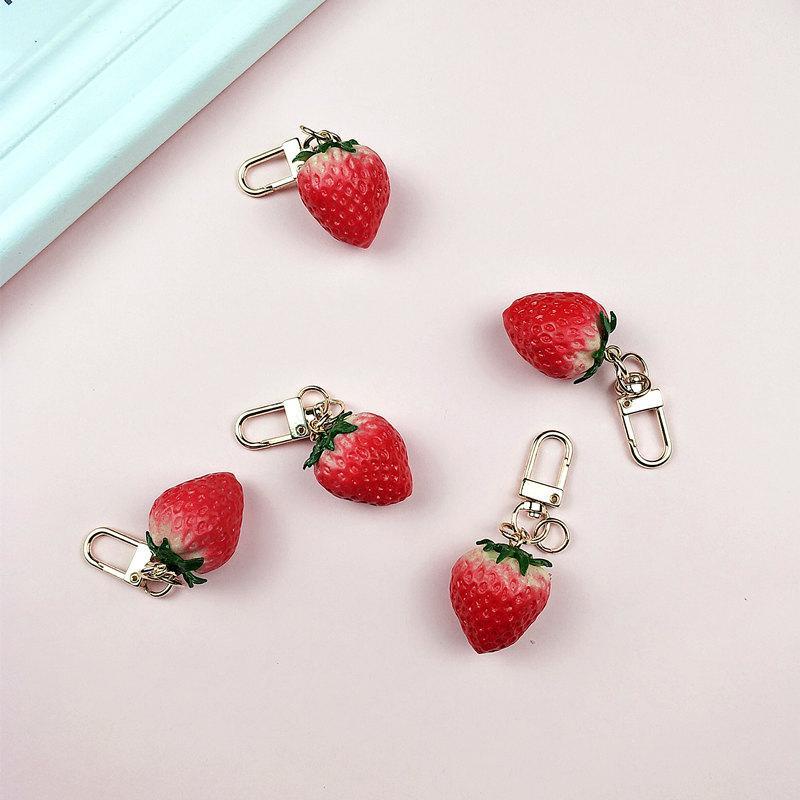 Móc Khóa Mềm Mại Hình Quả Dâu Tây Kiểm Soát Lượng Nhẹ Sáng Tạo Dễ Thương