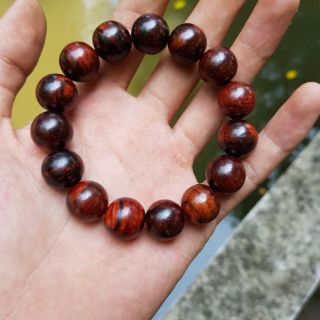 Vòng tay gỗ sưa hạt tròn 14 m m