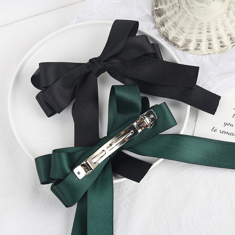 Kẹp tóc đính nơ ruy băng xinh xắn phong cách nữ tính