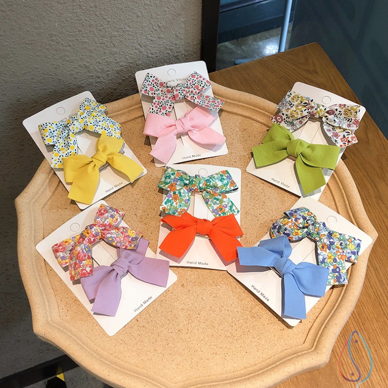 Kẹp tóc cho bé gái set 2 chiếc đính nơ rất dễ thương phiên bản Hàn Quốc