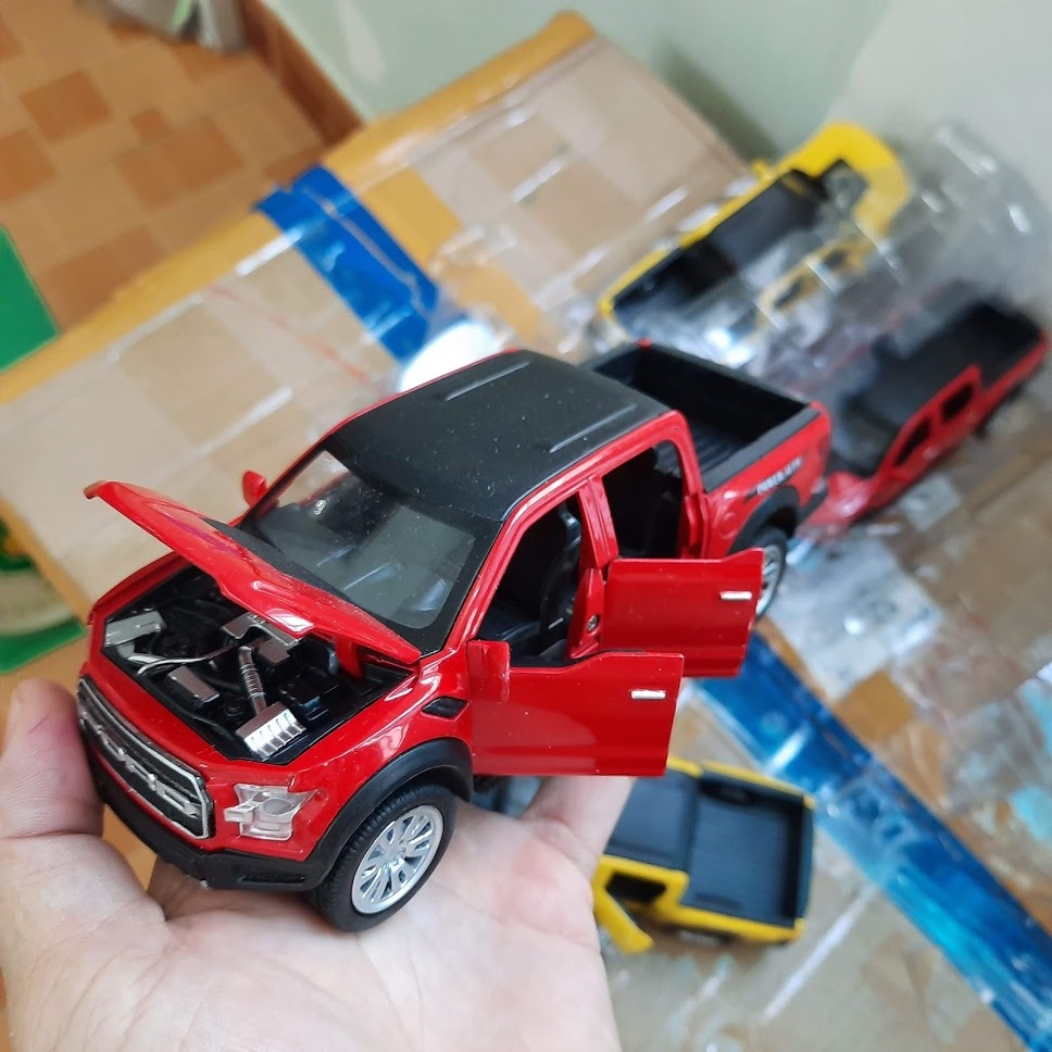 Xe mô hình ô tô Ford Ranger offroad 4x4 đồ chơi trẻ em tỉ lệ 1:32 xe ô tô làm bằng kim loại có đèn và âm thanh