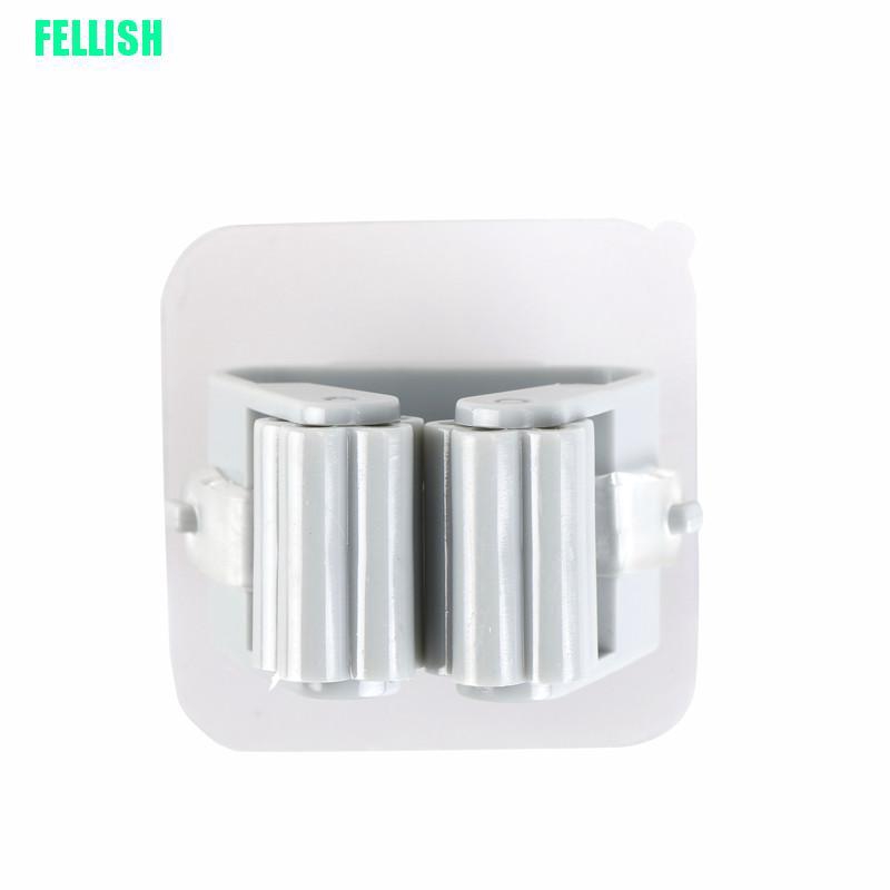 Giá treo cây lau nhà dán tường tiện lợi