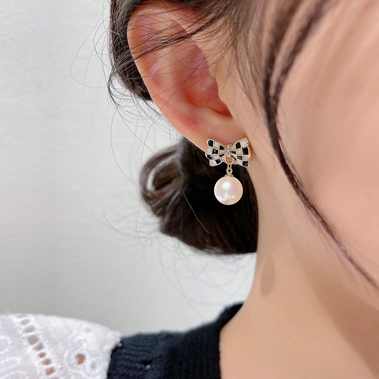 (MỚI) Bông tai hình nơ đính ngọc trai