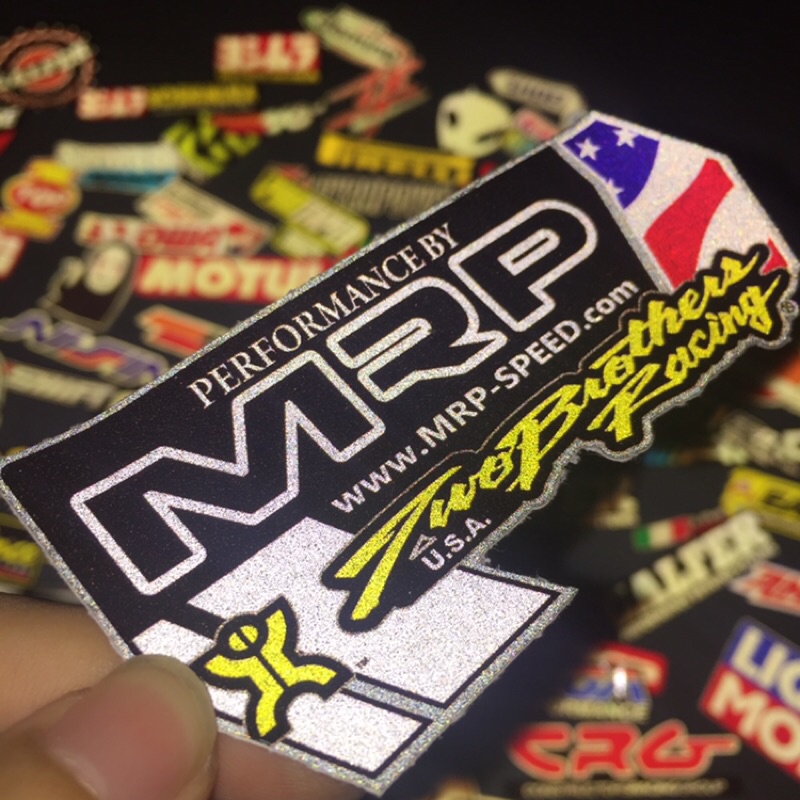 Logo TBs racing chất liệu phản quang . Kích thước 10.4 x 5.8cm. Hình dán decal siêu dính. Chống nước, tem đua trang trí.